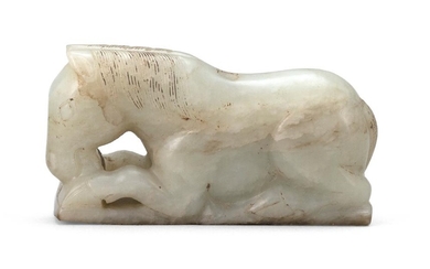 CELADON AND BROWN JADE CARVING OF A RECLINING...