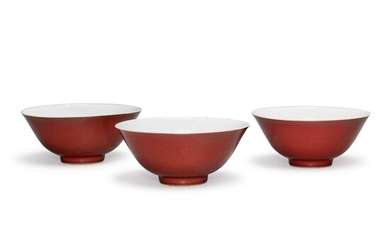THREE COPPER-RED GLAZED BOWLS, QIANLONG SEAL MARKS AND PERIOD