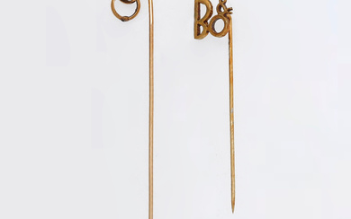 Two gold tie pins.