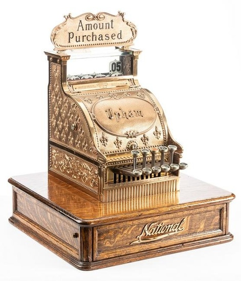 Very unusual antique brass National Cash Register, Model 6, on quarter sawn oak base with drawer