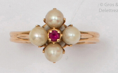 Yellow gold ring, decorated with four cultured pearls...