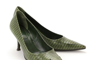 SOLD. miu miu: A pair of stilettos made of green snakeskin with pointed toes and...
