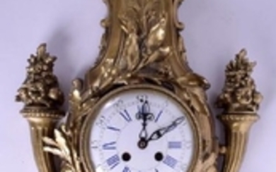 A 19TH CENTURY FRENCH GILT BRONZE CARTEL CLOCK overlaid