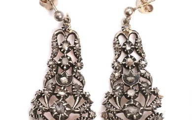 A pair of diamond earrings set with numerous rose-cut diamonds, mounted in silver and gold. L. 4.3 cm. Late 19th century. (2)