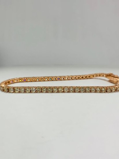 14ct Rose Gold Diamond tennis bracelet featuring, 59...