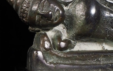 16/17thC Burmese lead/bronze Buddha in a reclining position.