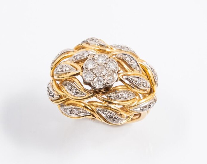 18k (750 thousandths) yellow gold dome ring set with a...