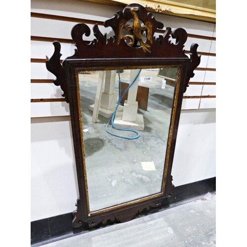 19th century wall mirror with fretwork carved frame surmount...