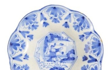 44- Holland: small gadrooned dish with blue monochrome decoration of...