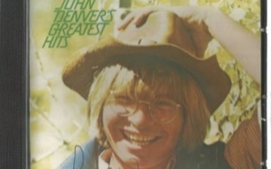 John Denver signed to front insert of CD John Denvers greatest hits. Good Condition. All signed pieces come with a Certificate...