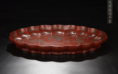 A LACQUER CARVED DRAGON PATTERN PLATE