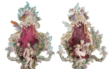 A pair of Meissen flower-encrusted allegorical two-branch wall appliques