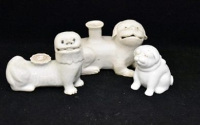 Three Chinese Blanc De Chine Porcelain Dogs