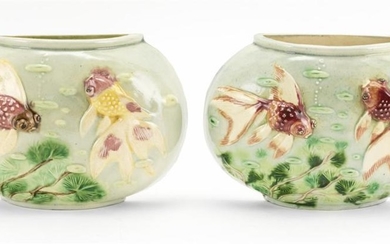 PAIR OF MAJOLICA WALL POCKETS Both in the form of fish bowls, decorated with goldfish in high relief. Impressed numbers, otherwise u...