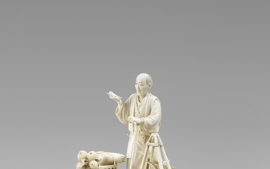 An ivory okimono of a flower and plant vendor. Late 19th century