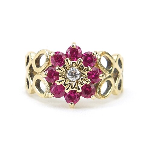 9ct gold ruby and clear stone flower head ring with pierced ...