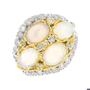 A 1970s 18ct gold opal and diamond cluster ring.