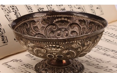 A 19th century Dutch silver pedestal bowl, chased with scrol...