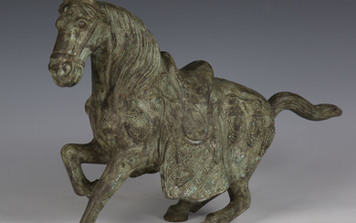 A 20th century South-east Asian verdigris bronze model of a horse, height 30cm.