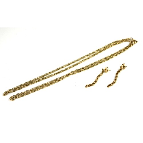 A 9CT GOLD NECKLACE A single row of pierced links. Together...