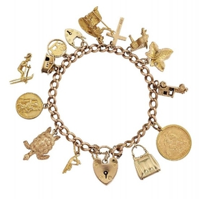 A 9ct gold charm bracelet, comprising: fourteen...