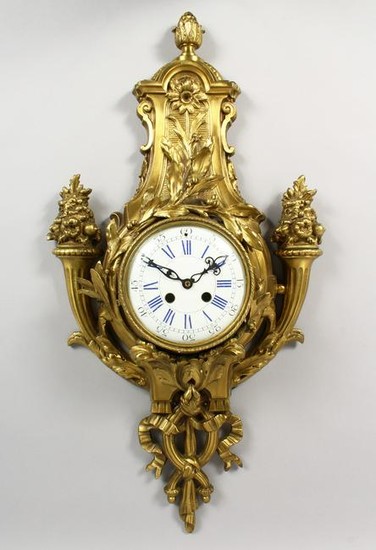 A BRONZE CASED CARTEL WALL CLOCK, with white porcelain