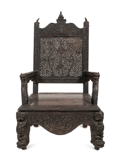 A Burmese Carved Hardwood Armchair