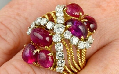 A Burmese ruby cabochon and diamond dress ring.With