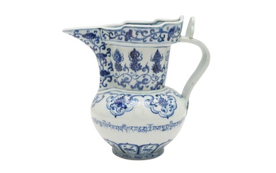 A CHINESE BLUE AND WHITE MING-STYLE MONK'S CAP EWER