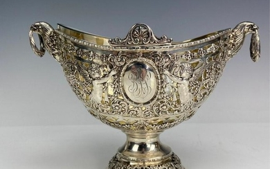 A CONTINENTAL RETICULATED SILVER BOWL WITH GLASS INSERT