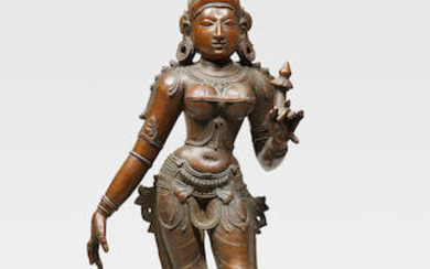 A COPPER ALLOY FIGURE OF BHUDEVI