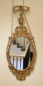 A Carved Giltwood Mirror, the moulded frame with an acanthus...
