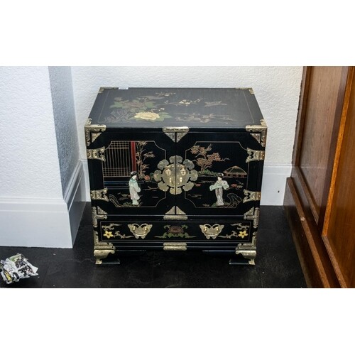 A Chinese Black Lacquered Cabinet, painted floral gilt decor...