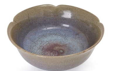 A Chinese Jun-type floral bowl, Republic period, covered in a lavender glaze thinning to mushroom tone around the rim, with single purple 'splash' to interior, 17.5cm diameter 民國 仿鈞釉花口碗