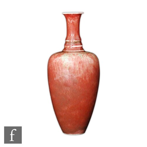 A Chinese 'Peach Bloom' vase, Kangxi (1662-1722) six charact...