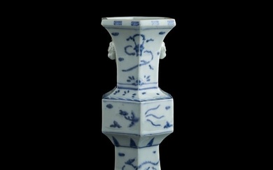 A Chinese blue and white gu vase with beast handles, 19th century