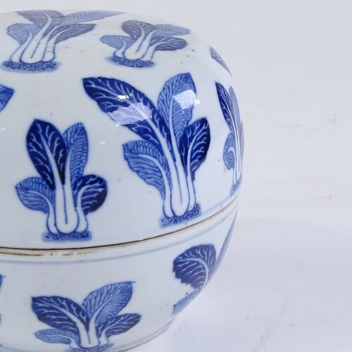 A Chinese blue and white porcelain bowl and cover, with pak ...