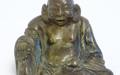 A Chinese cast model of Budai - The Laughing Buddha.