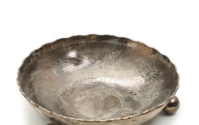 A Chinese export sterling silver bowl, engraved with dragon and Phoenix, raised...