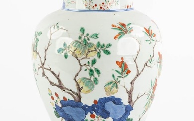 A Chinese pot, Wuchai decorated with growing fruits and blossoms. (H:31 x D:25 cm)