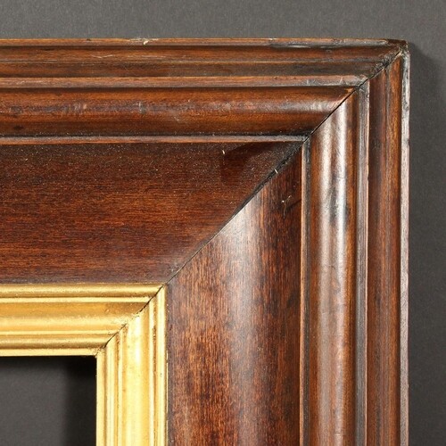 A Continental polished hardwood frame with gilded slip, reba...