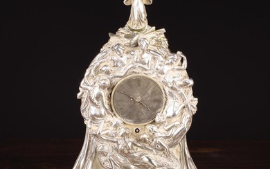 A Exhibition Silver Electrotype Mantel Clock in an highly decorative figural case designed by John B