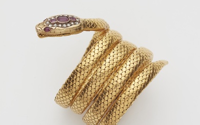 A French Art Nouveau 18k gold synthetic ruby and diamond tubogaz snake bangle.