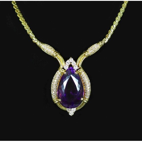 A French Boucheron gold, pear shaped amethyst and diamond cl...