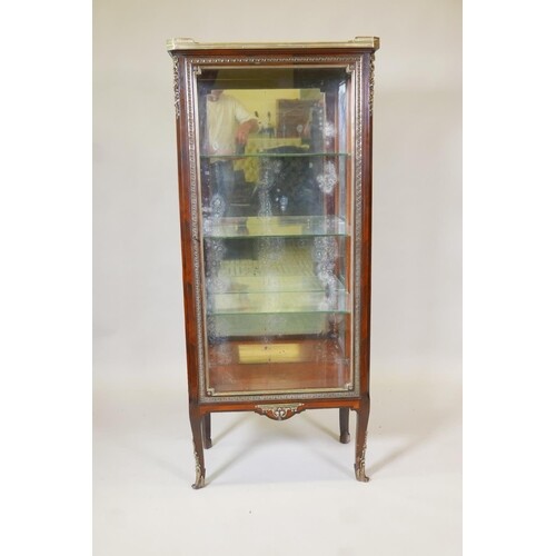 A French Empire style rosewood vitrine, with marble top and ...