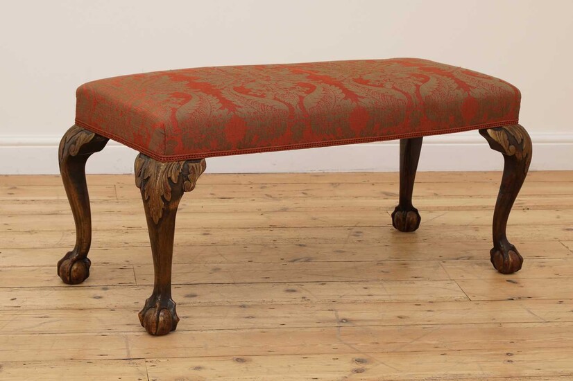 A George II-style walnut and parcel-gilt stool
