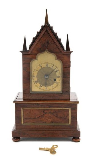 A Gothic Revival Brass Mounted Mantel Clock
