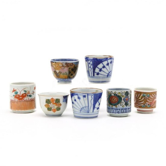 A Group of Seven Japanese Porcelain Sake Cups