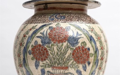 A JAPANESE CERAMIC URN AND COVER, DECORATED WITH FLORAL SCENE IN THE IMARI PALETTE, 54CM H