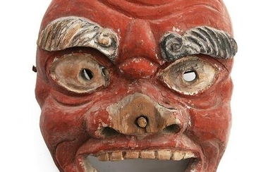 A Japanese noh mask of an Oni or Tengu
